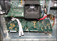 A photo of the computer, showing its motherboard. 