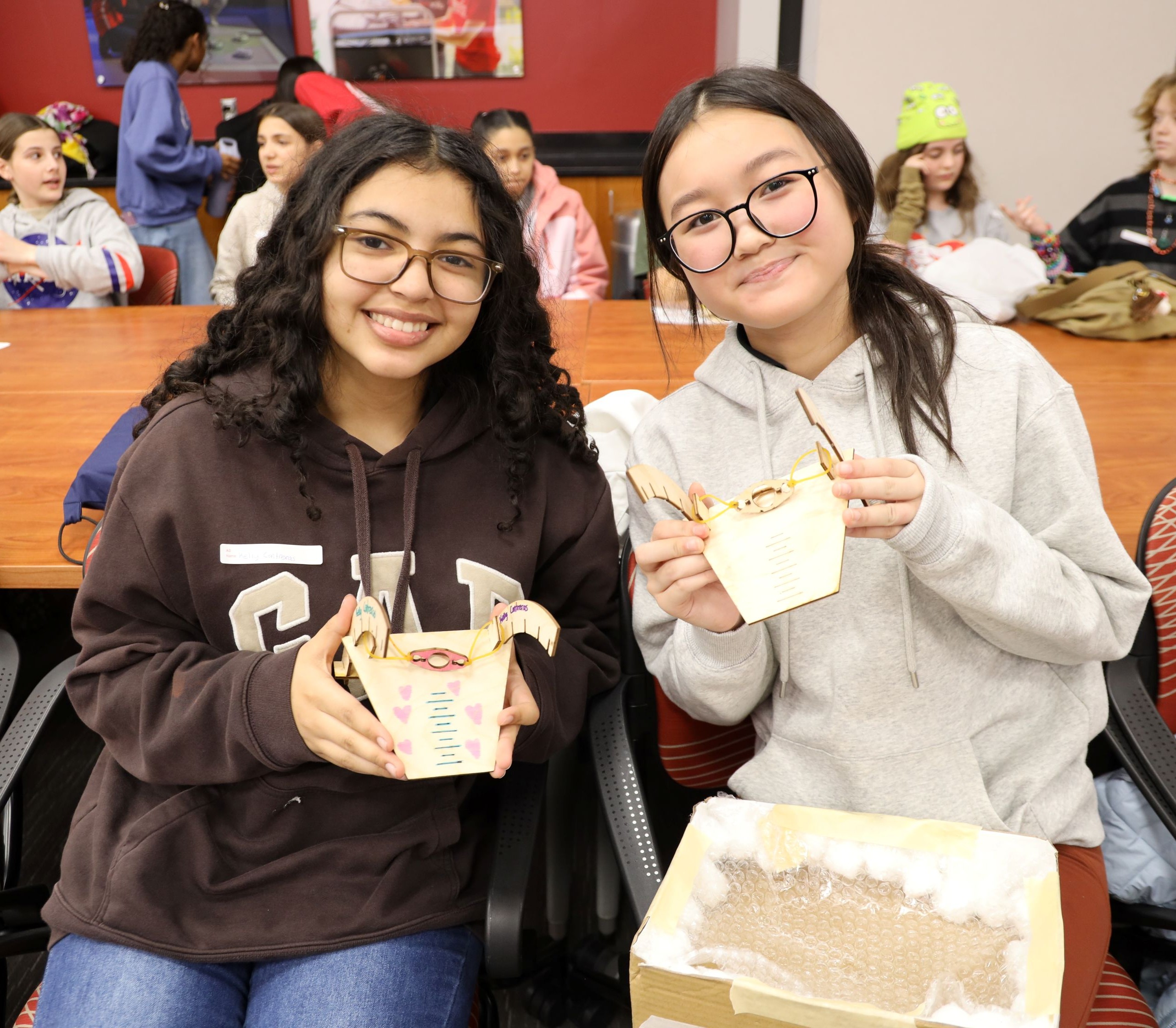 Middle school students with GOAL kit