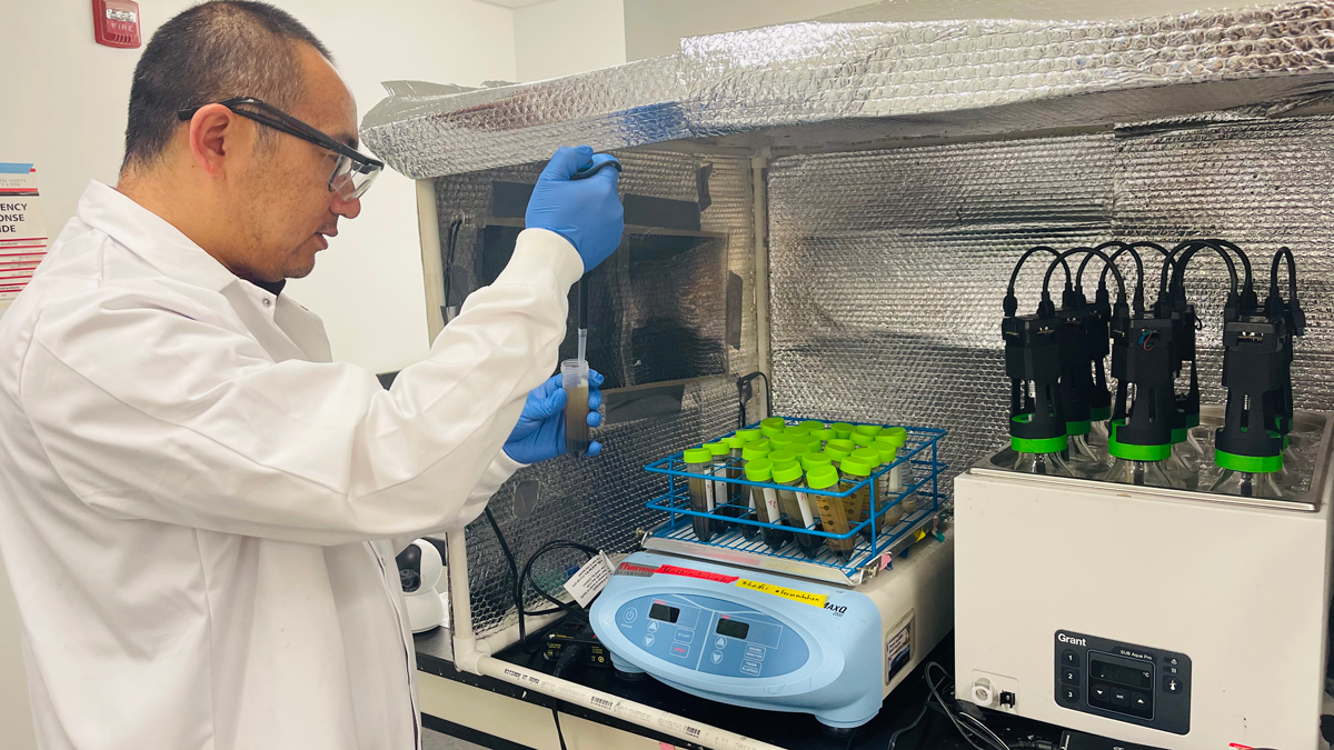 Faculty Member Guangbin Li pictured in his lab