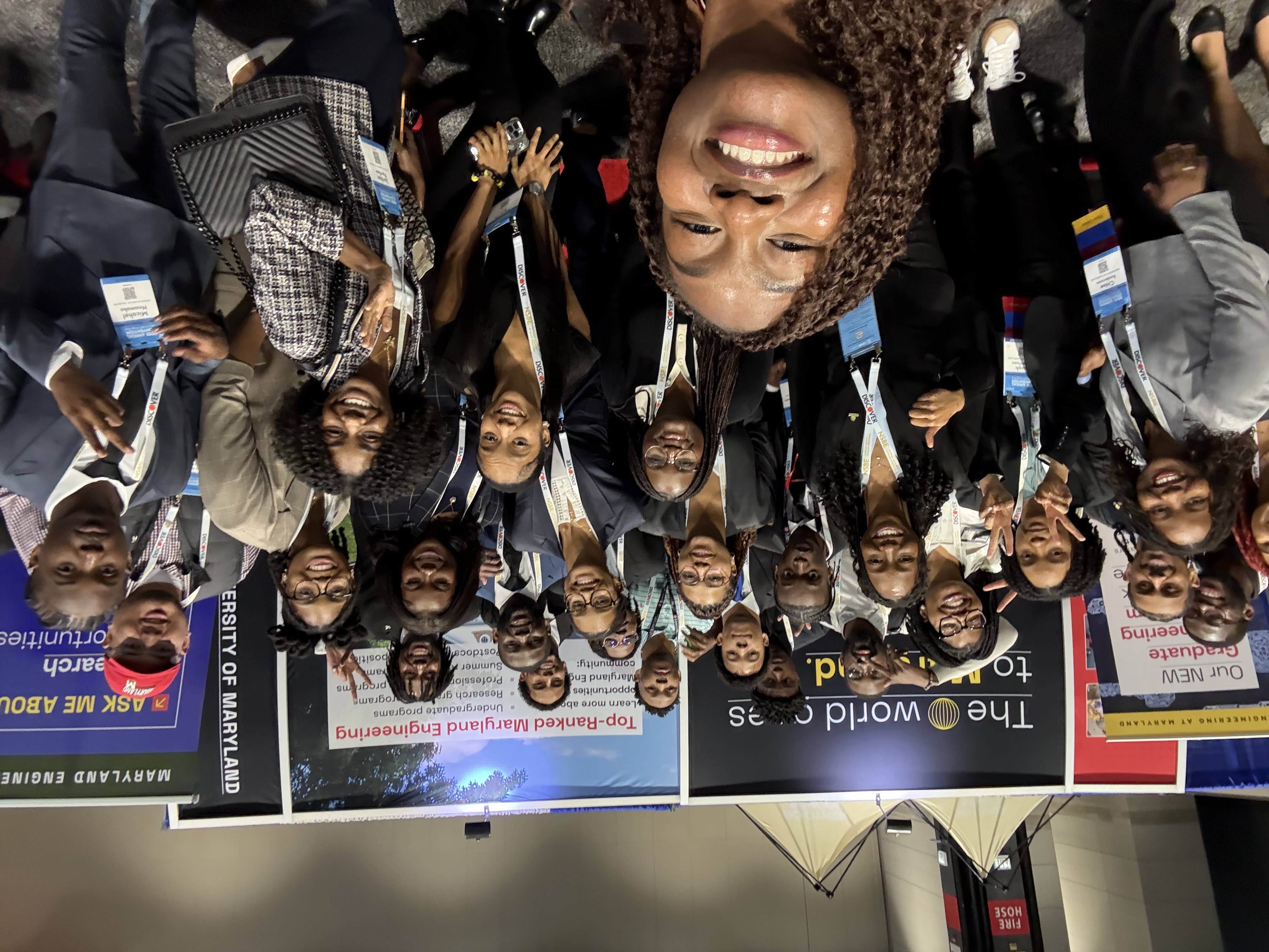 Students take a selfie at a conference event