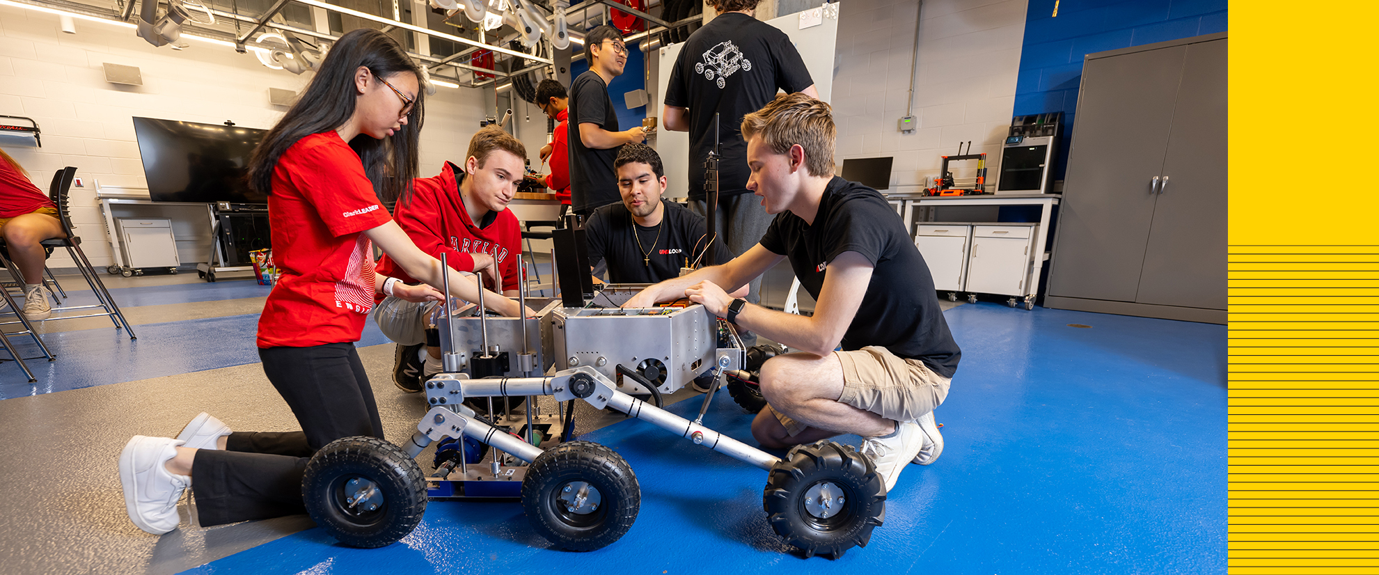 students working on rover