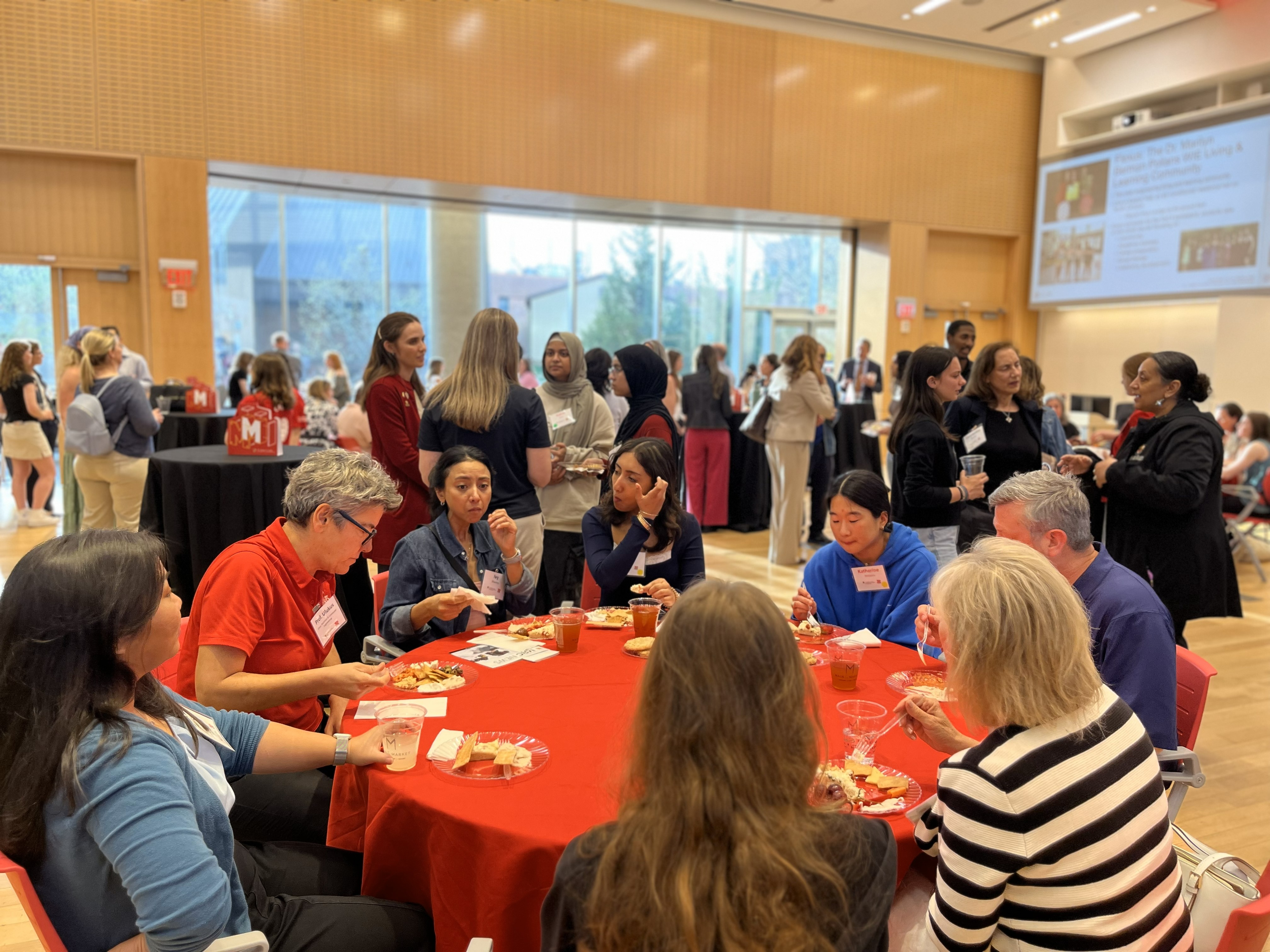 Admitted students and Clark School staff and faculty networking at reception