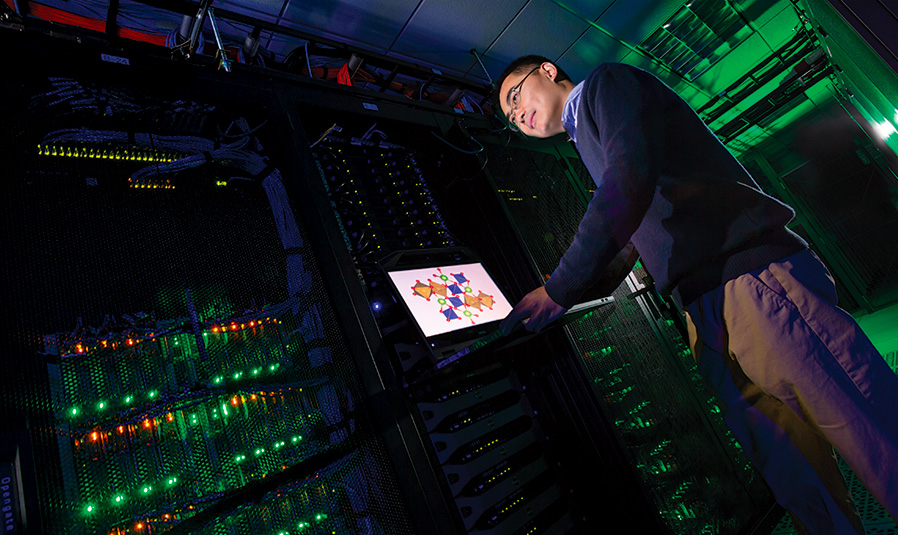Assistant Professor Yifei Mo works in Deepthought2, UMD's high-performance computing cluster. Photo: John T. Consoli