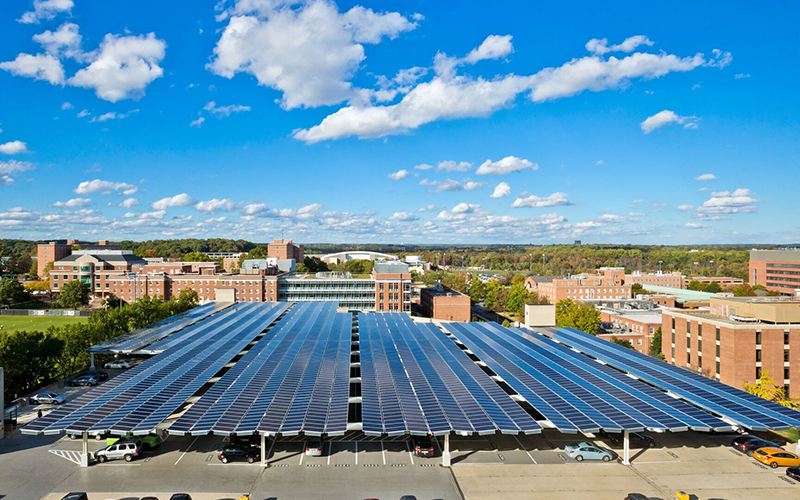 photograph of solar panels on top of Regent's Garage with UMD campus in the background