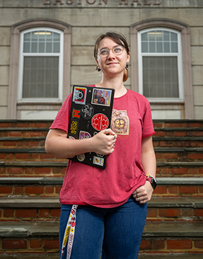 Ava Monroe in front of Easton Hall
