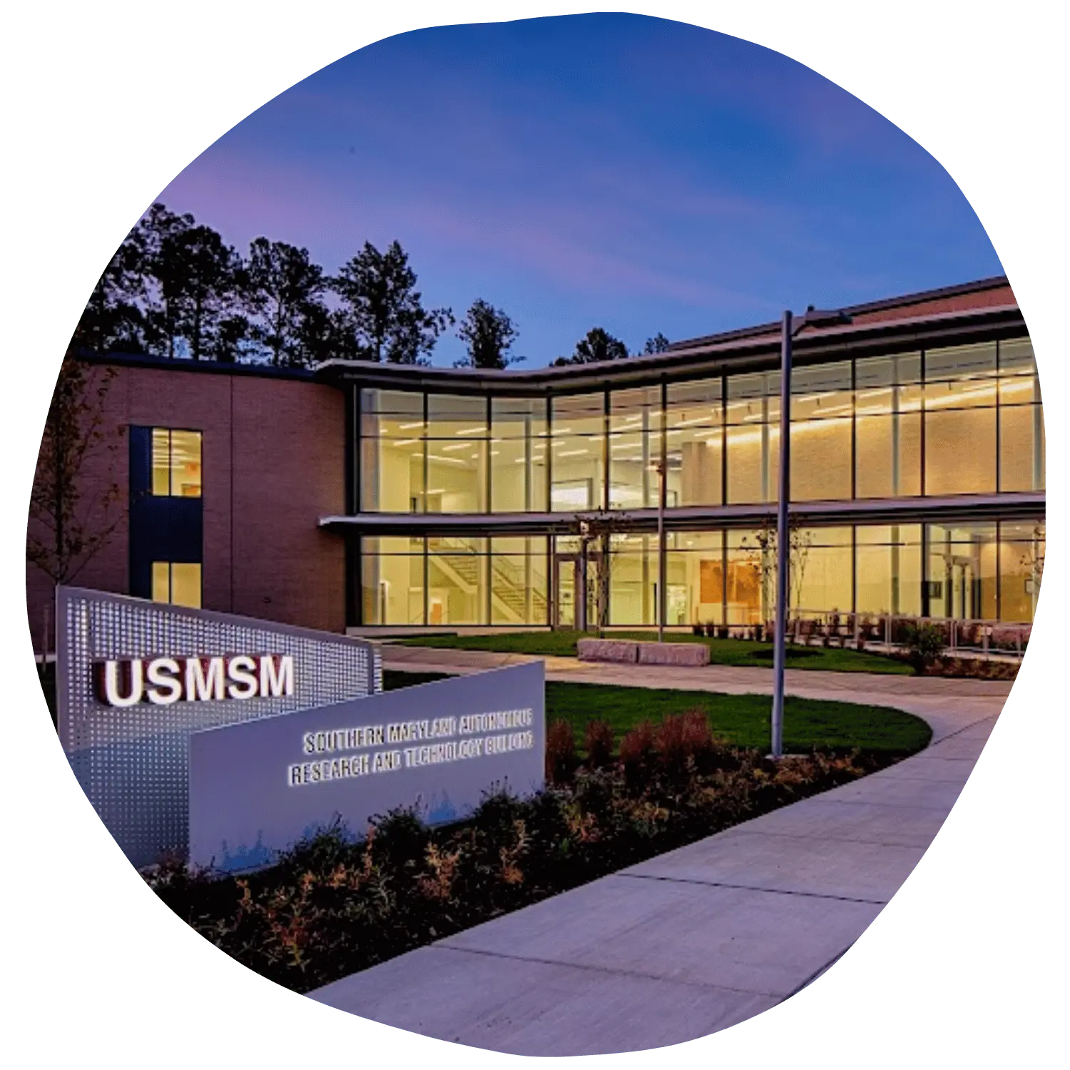 USMSM SMART building exterior during the night time.