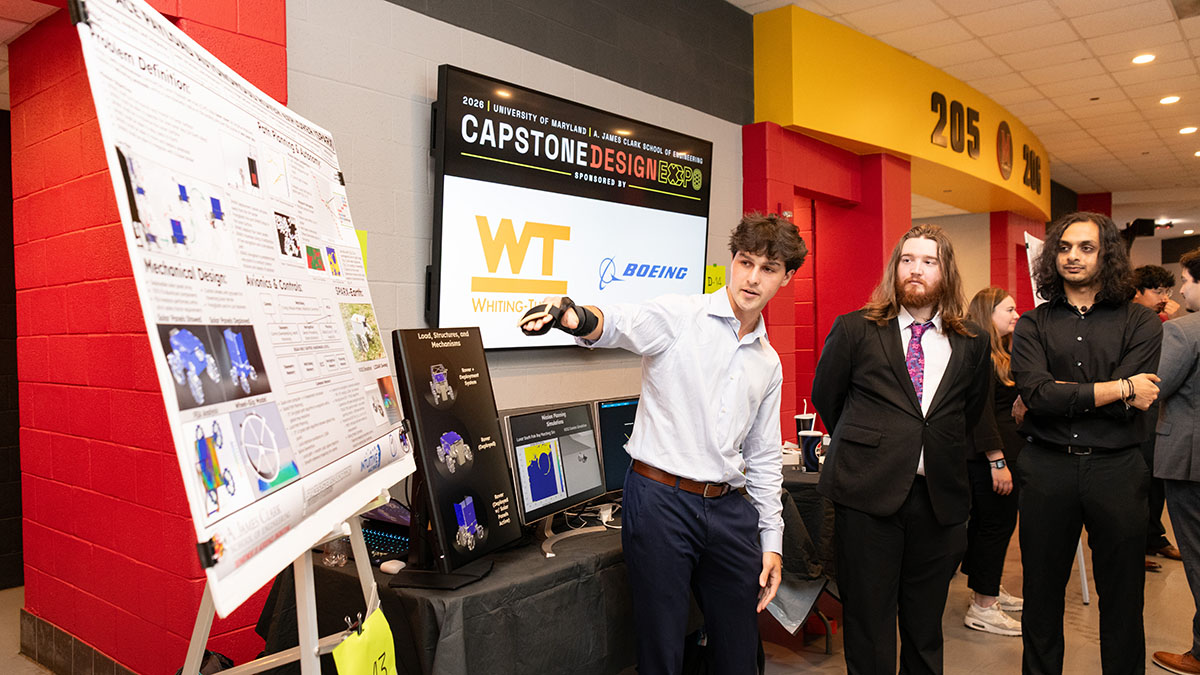 AE point to their research poster