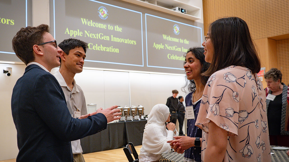 Students talk in a small group
