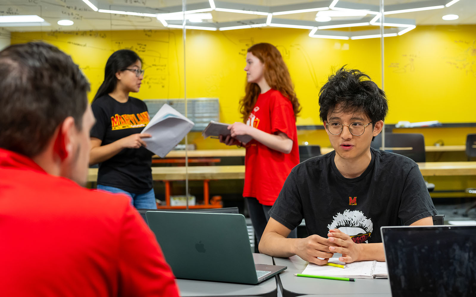 Maryland Engineering students collaborate at a desk with computers