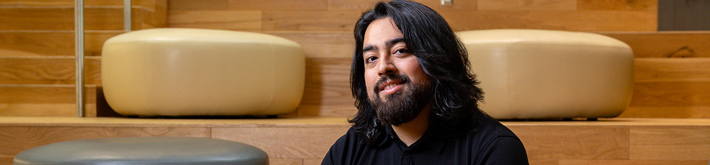 Leo Buitrago poses inside the Universities at Shady Grove
