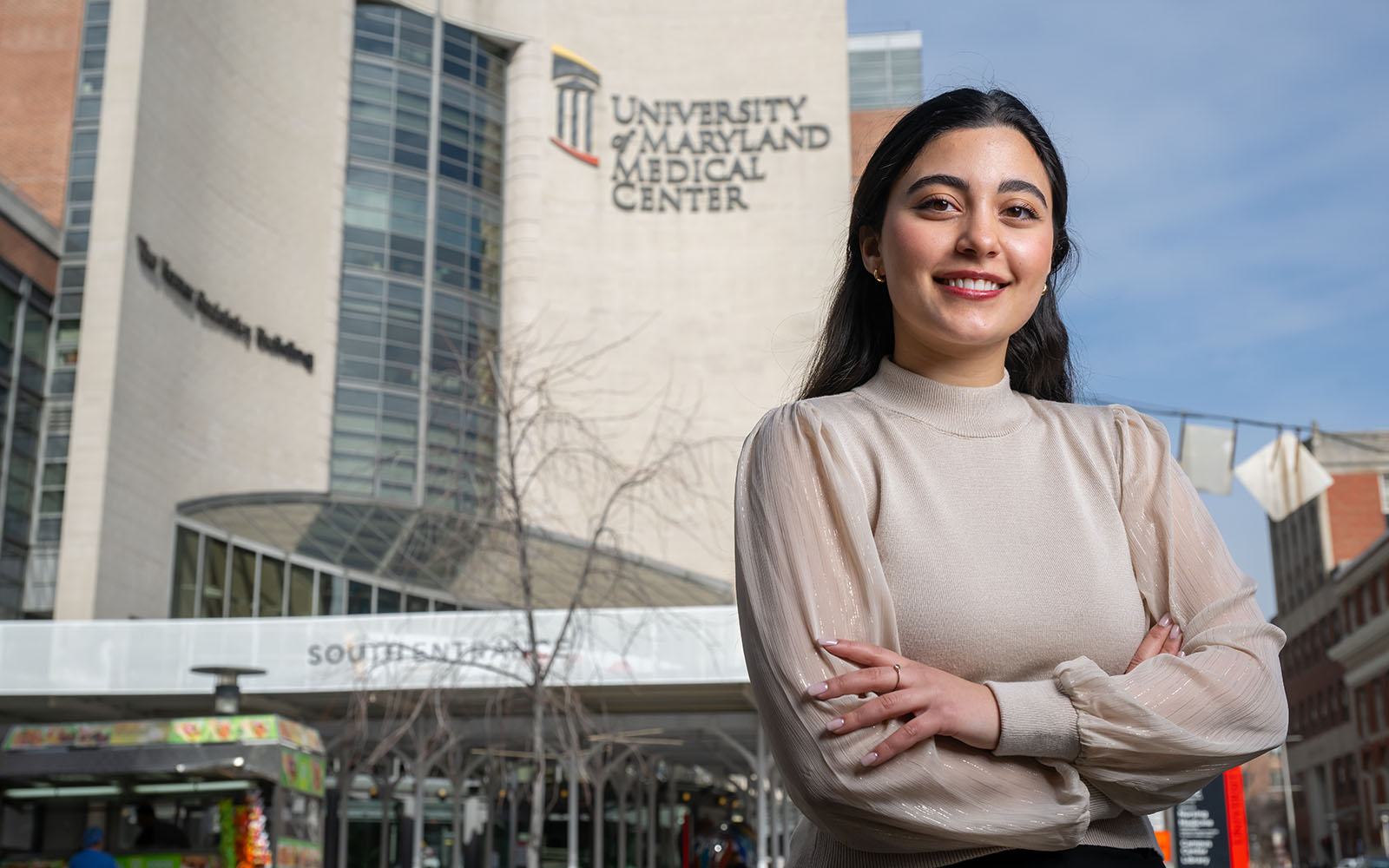 Nane Manyukan poses in front of the University of Maryland Medical Center