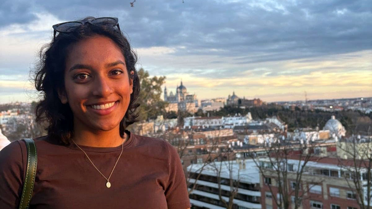 Natalie Venginickal with a Spanish city in the background