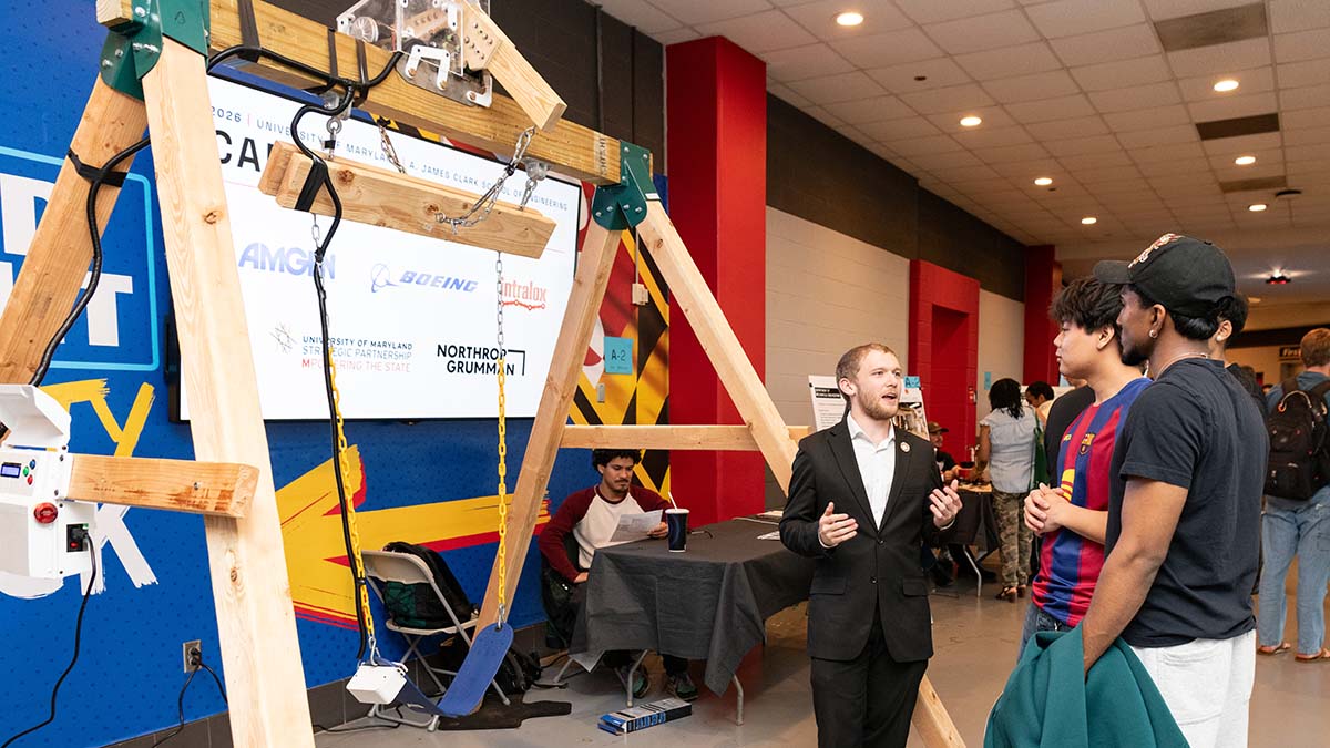 Hersey with the swing at the Capstone Design Expo